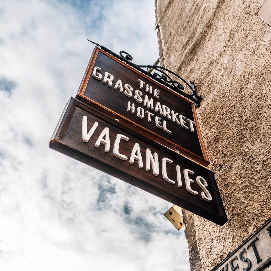 Signage for 'The Grassmarket Hotel' displaying 'Vacancies'